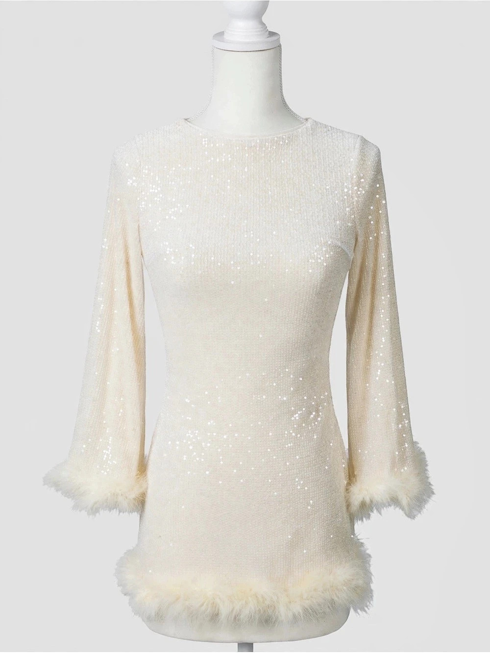 Feather Trim Sequin Mini Dress in White.